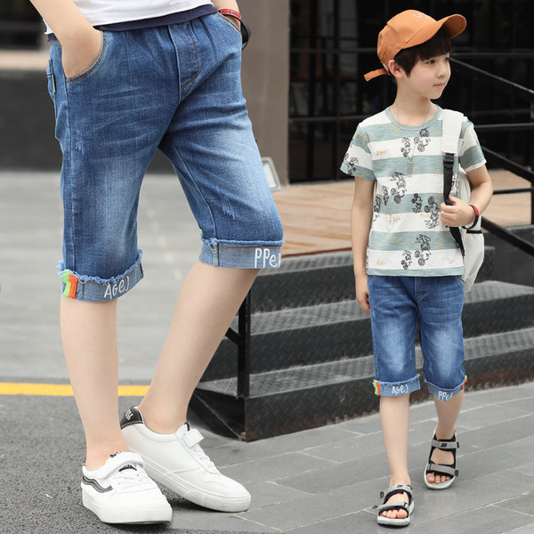 Blugi pentru copii cu elemente colorate și inscripție