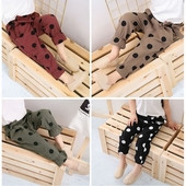 Pantaloni la modă pentru copii pentru o fată în mai multe culori cu o panglică