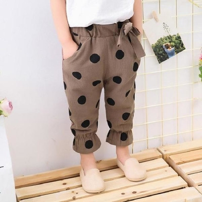 Pantaloni la modă pentru copii pentru o fată în mai multe culori cu o panglică