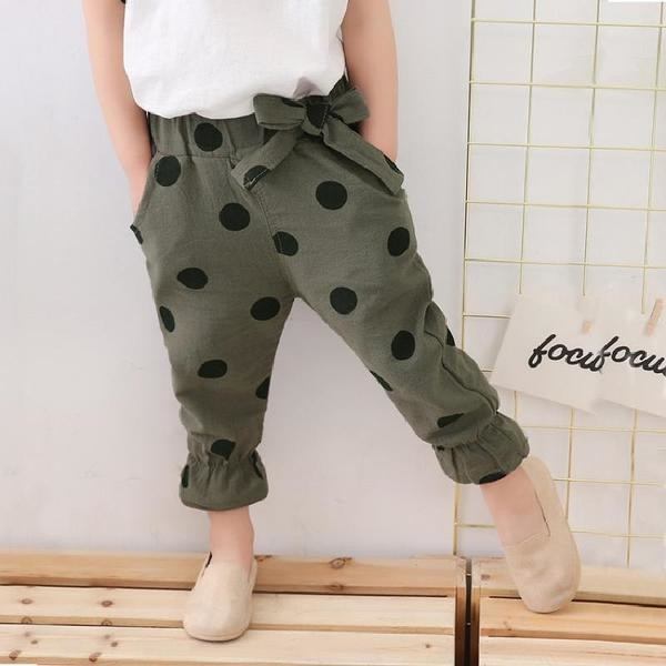 Pantaloni la modă pentru copii pentru o fată în mai multe culori cu o panglică