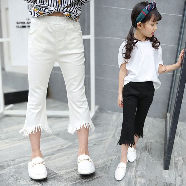 Pantaloni copii pentru fete cu lungime 7/8 si franjuri in alb si negru