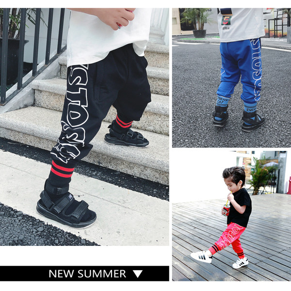 Pantaloni sport și casual pentru copii în mai multe culori cu inscripție