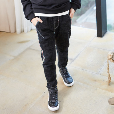 Παιδικά μοντέρνα τζιν σε σκούρο χρώμα με πολύχρωμη επένδυση