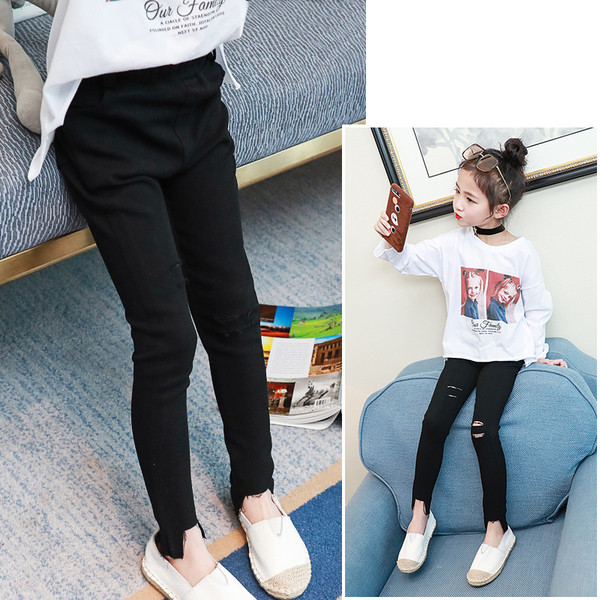 Pantaloni copii pentru o fata cu motive rupte in negru