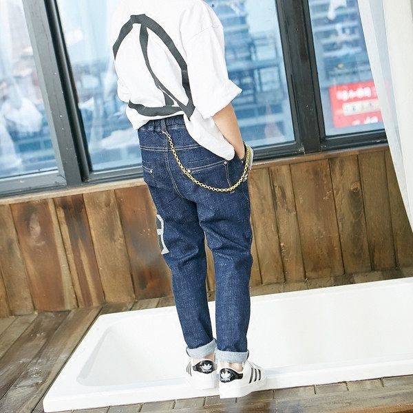 Blugi copii model lat de culoare inchisa cu imprimeu