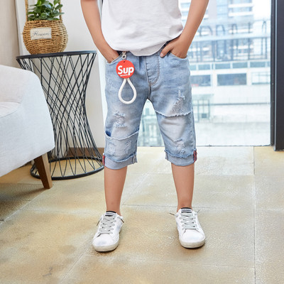 Blugi copii 7/8 cu motive rupte de culoare deschisa