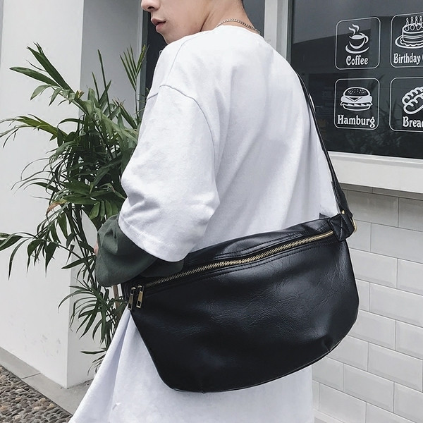 Ανδρική δερμάτινη τσάντα σε μαύρο και καφέ χρώμα