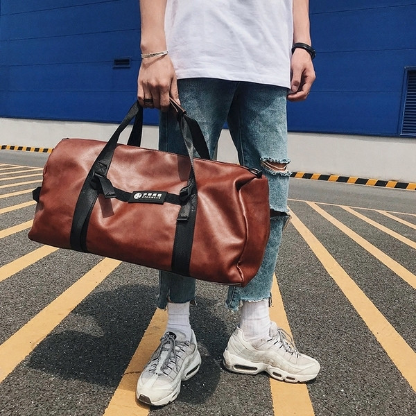 Ανδρική τσάντα σε δύο χρώματα κατάλληλα για ταξίδια ή αθλητισμό