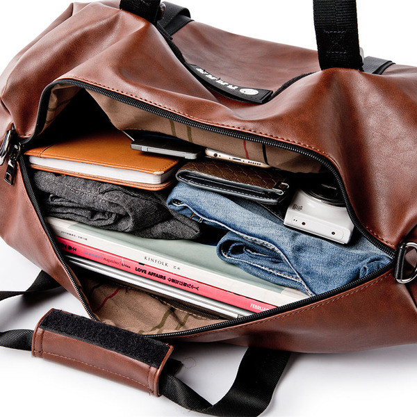 Ανδρική τσάντα σε δύο χρώματα κατάλληλα για ταξίδια ή αθλητισμό