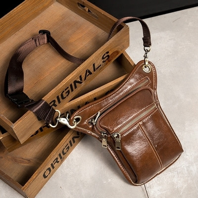 Geanta mica pentru barbati cu o forma interesanta in doua culori