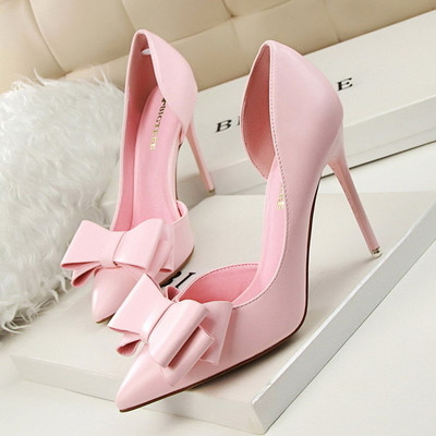 Formal women`s shoes with ribbons in several colors