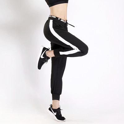 Pantaloni sport de damă cu bandă elastică largă cu inscripție și margine laterală albă