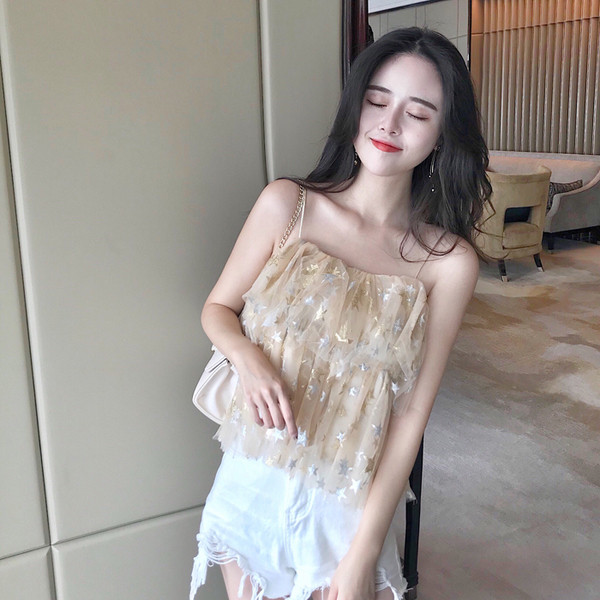 Top de dama de culoare deschisa cu elemente stralucitoare