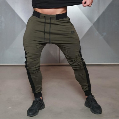 Costum sport barbatesc cu margine gri in doua culori