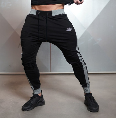 Costum sport barbatesc cu margine gri in doua culori