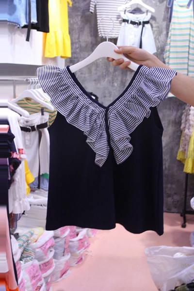 Maieu de damă cu volan în alb și negru