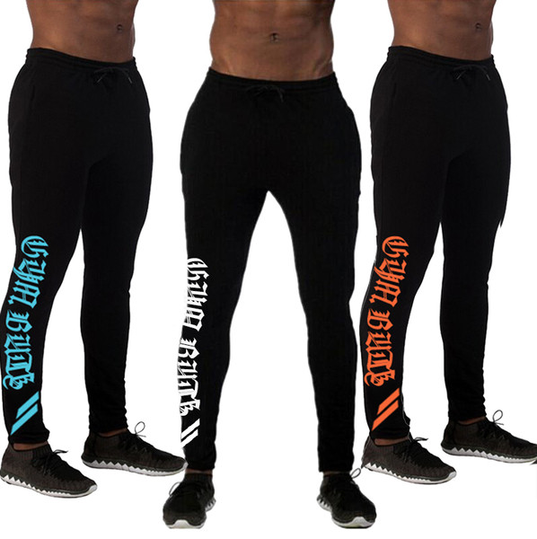 Costum bărbătesc din bumbac cu inscripții colorate