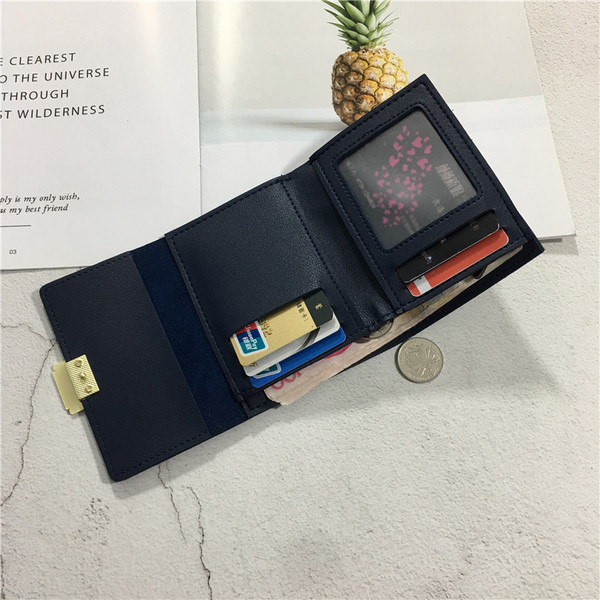 Модерен дамски портфейл в няколко цвята с метални елементи