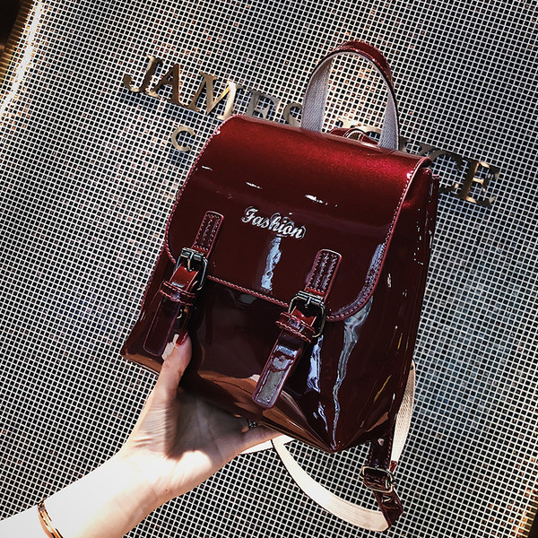 Модерна дамска раница от лак с надпис в четири цвята