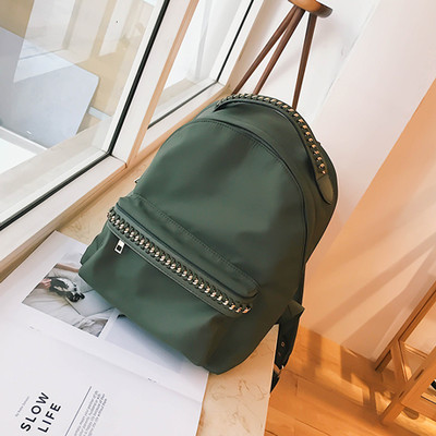 Дамска раница с метална декорация в два цвята