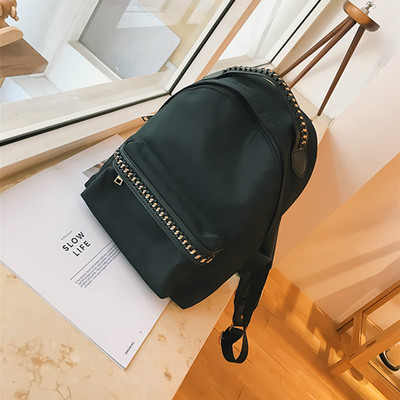 Дамска раница с метална декорация в два цвята