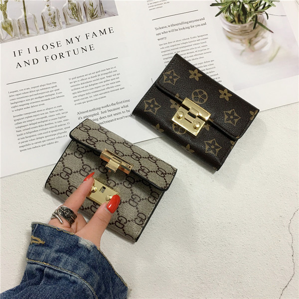 Модерен дамски портфейл с метална закопчалка