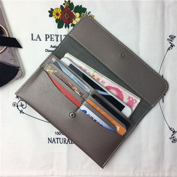 Дамски портфейл в няколко цвята с метална декорация