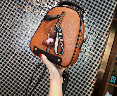 Малка дамска раница от еко кожа с аксесоар в няколко цвята