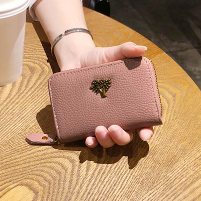 Малък дамски портфейл с цип и метална декорация