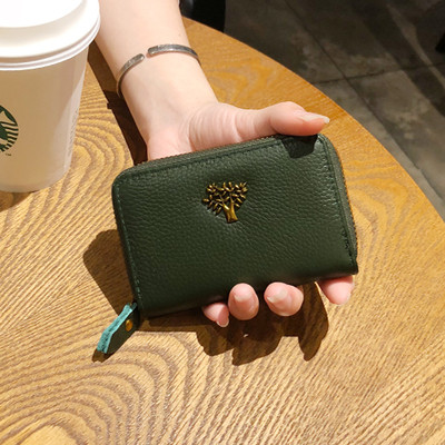 Малък дамски портфейл с цип и метална декорация