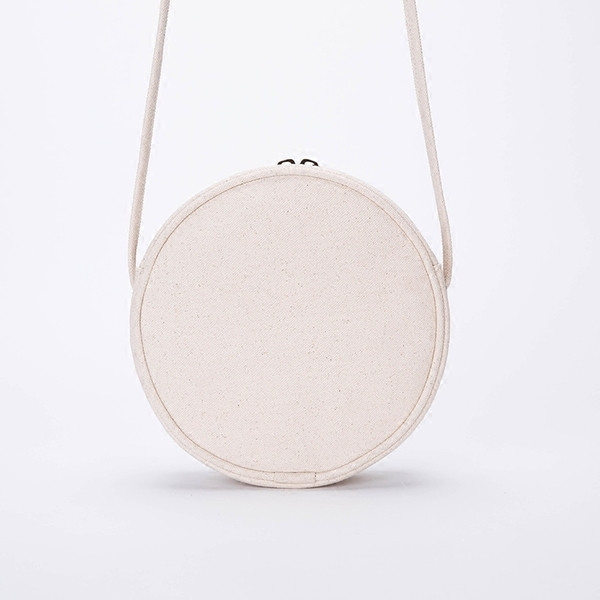 Geantă mică rotundă de damă cu o curea subțire de umăr