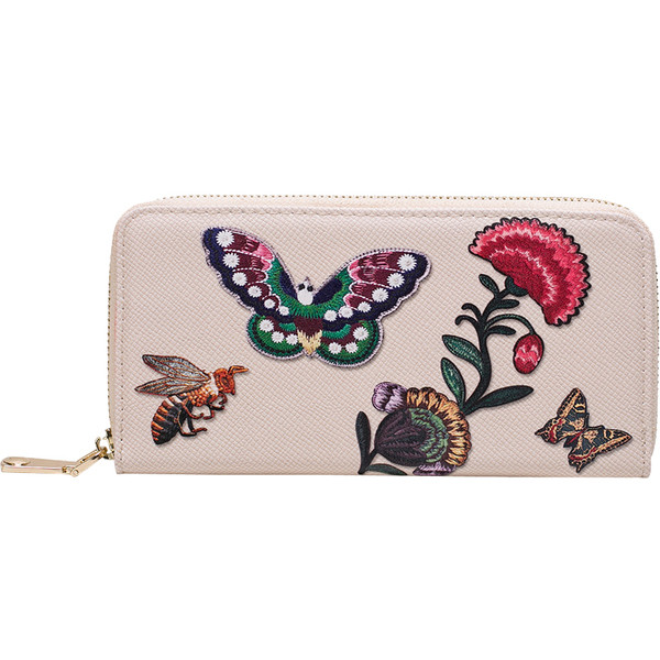 Frumos portofel de dama cu fermoar si motive florale