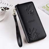 Голям дамски портфейл с флорални мотиви в няколко цвята