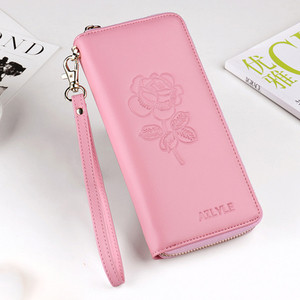 Голям дамски портфейл с флорални мотиви в няколко цвята