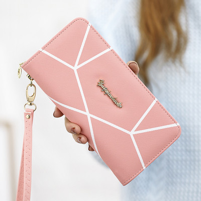 Μοντέρνο γυναικείο πορτοφόλι με φερμουάρ και μεταλλική επιγραφή σε διάφορα μοντέλα