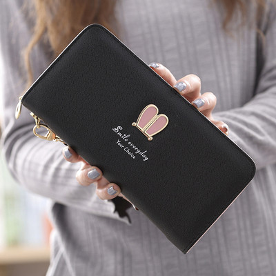 Μοντέρνο γυναικείο πορτοφόλι με φερμουάρ και μεταλλική επιγραφή σε διάφορα μοντέλα