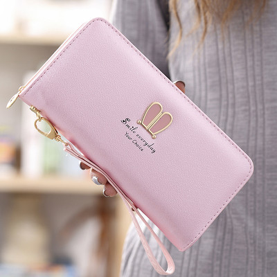 Μοντέρνο γυναικείο πορτοφόλι με φερμουάρ και μεταλλική επιγραφή σε διάφορα μοντέλα