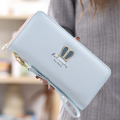 Μοντέρνο γυναικείο πορτοφόλι με φερμουάρ και μεταλλική επιγραφή σε διάφορα μοντέλα