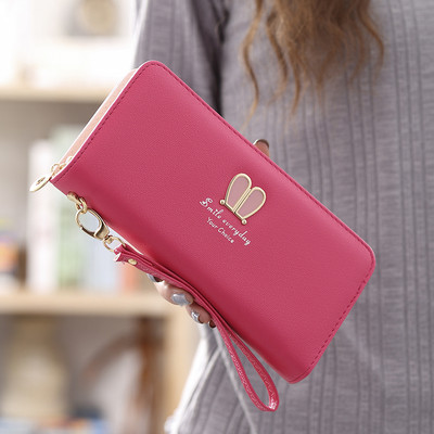 Μοντέρνο γυναικείο πορτοφόλι με φερμουάρ και μεταλλική επιγραφή σε διάφορα μοντέλα