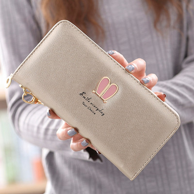 Μοντέρνο γυναικείο πορτοφόλι με φερμουάρ και μεταλλική επιγραφή σε διάφορα μοντέλα