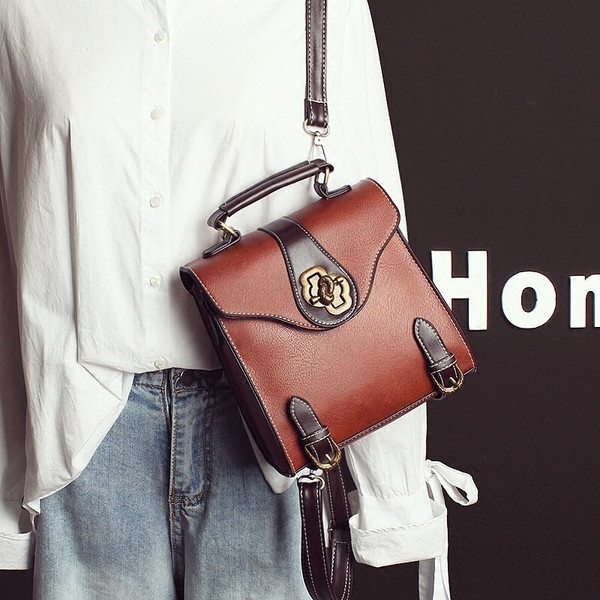 Малка дамска раница от еко кожа в черен, кафяв и зелен цвят