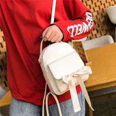 Дамска раница с външен джоб и панделка в няколко цвята