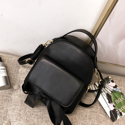 Дамска раница с външен джоб и панделка в няколко цвята