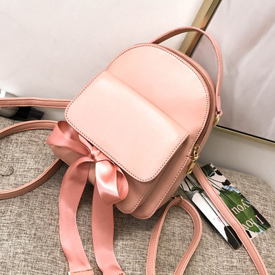 Дамска раница с външен джоб и панделка в няколко цвята