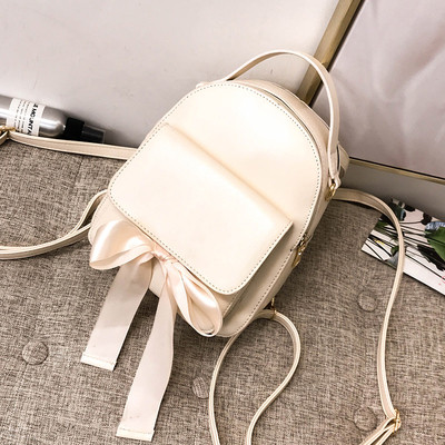 Дамска раница с външен джоб и панделка в няколко цвята