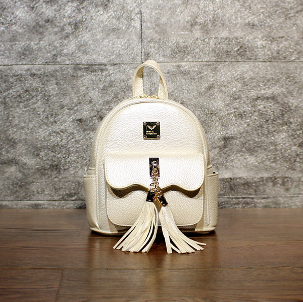 Rucsac mic de dama din piele ecologica cu ciucuri in patru culori