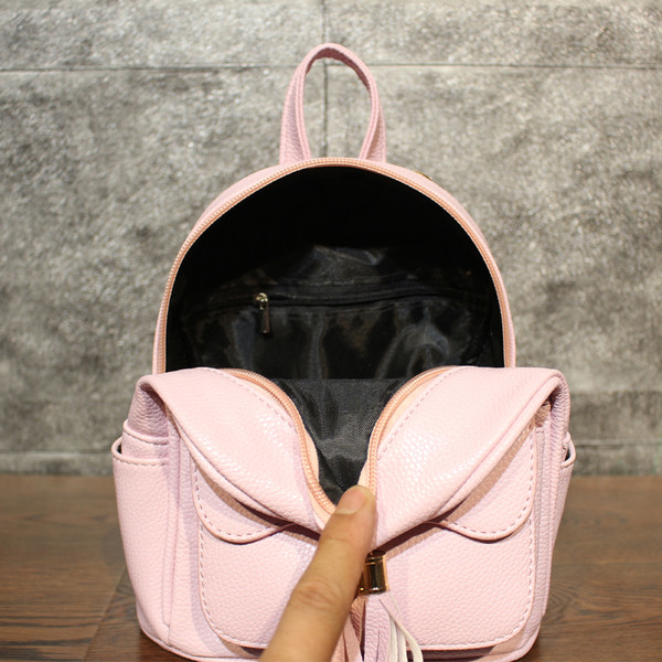 Rucsac mic de dama din piele ecologica cu ciucuri in patru culori