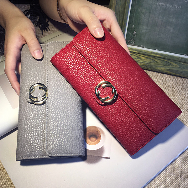 Елегантен дамски портфейл с метална декорация от еко кожа