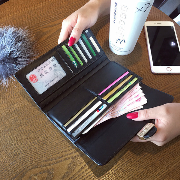 Елегантен дамски портфейл с метална декорация от еко кожа