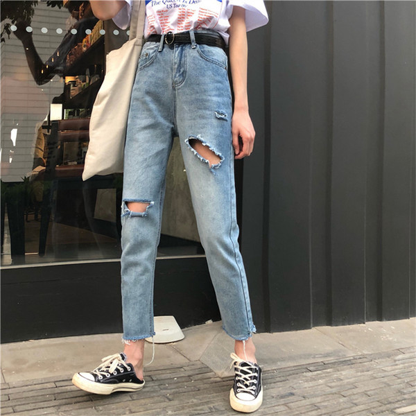 Blugi de dama cu talie inalta si motive rupte